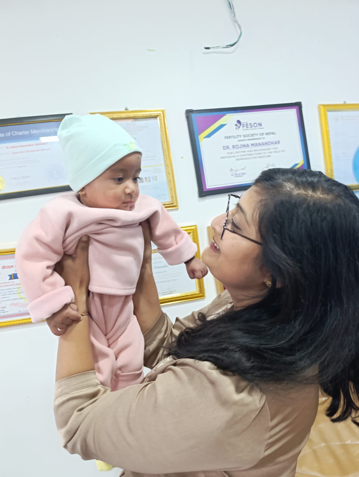 Dr. Rojina with baby